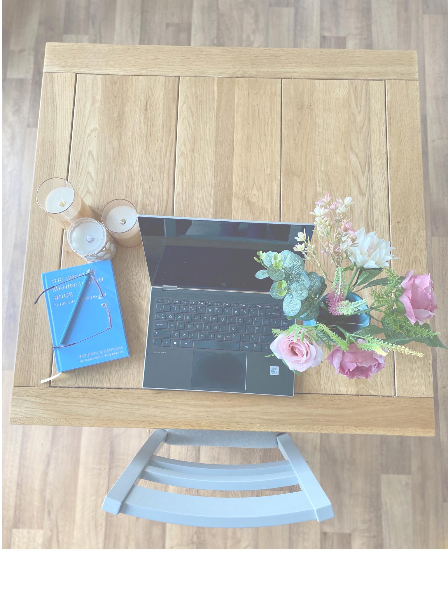 Jenny Brown holding mug at laptop